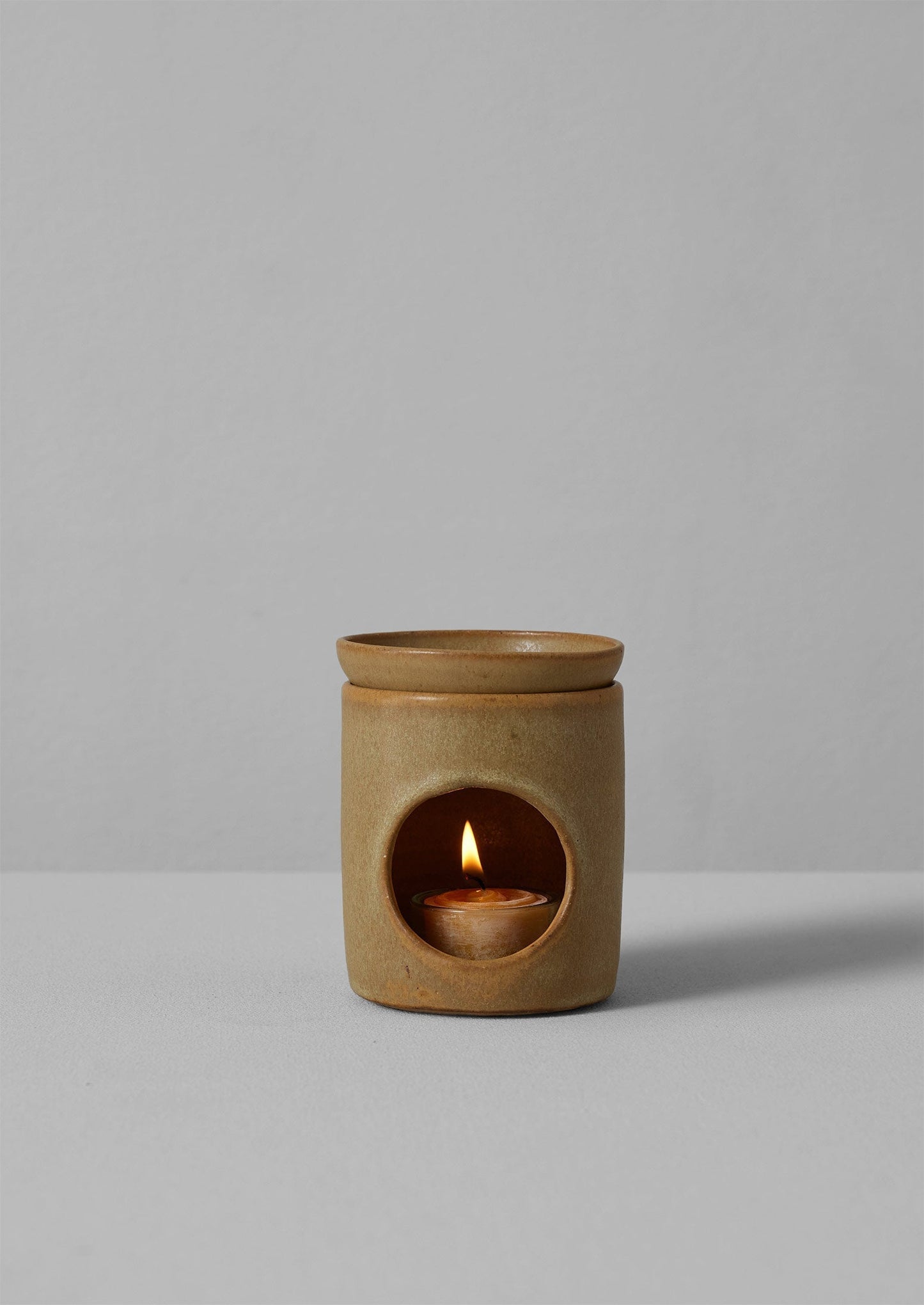 Bruciatore a olio Rebecca Proctor | Ocra