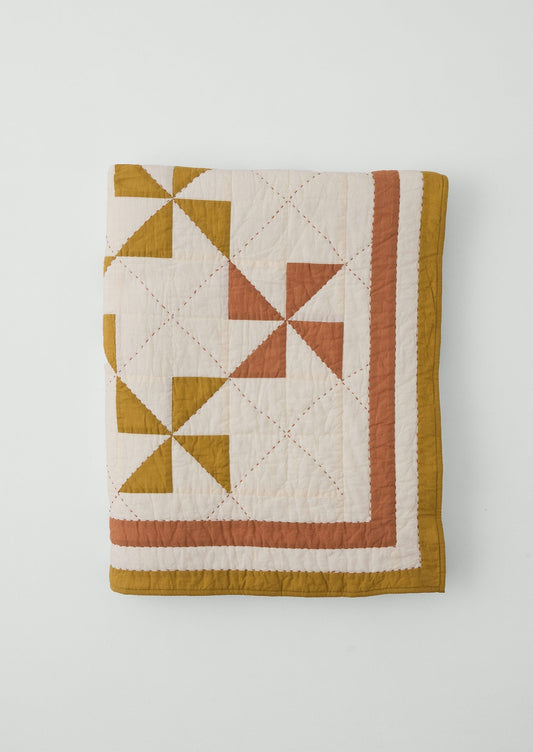 Trapunta patchwork a girandola | Kelp/Kalamata