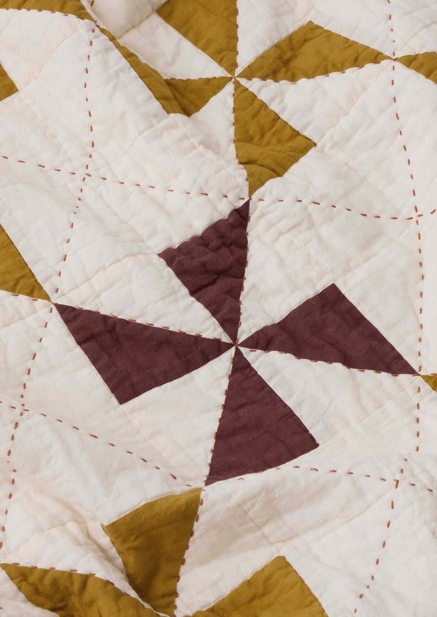 Trapunta patchwork a girandola | Kelp/Kalamata