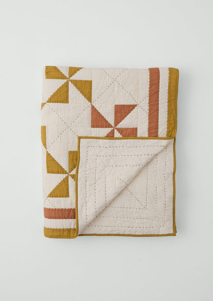 Trapunta patchwork a girandola | Kelp/Kalamata