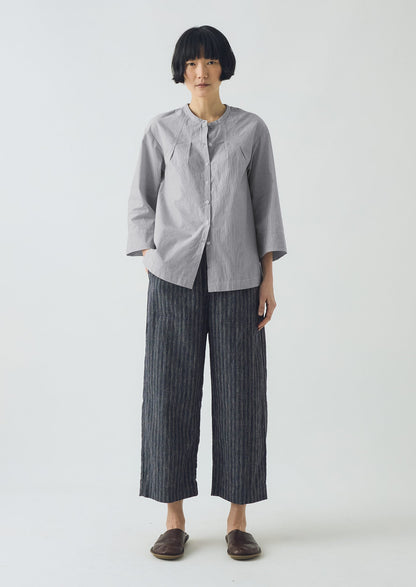 Pantaloni a gamba a botte in lino e cotone a righe | Blu ombra/Nero