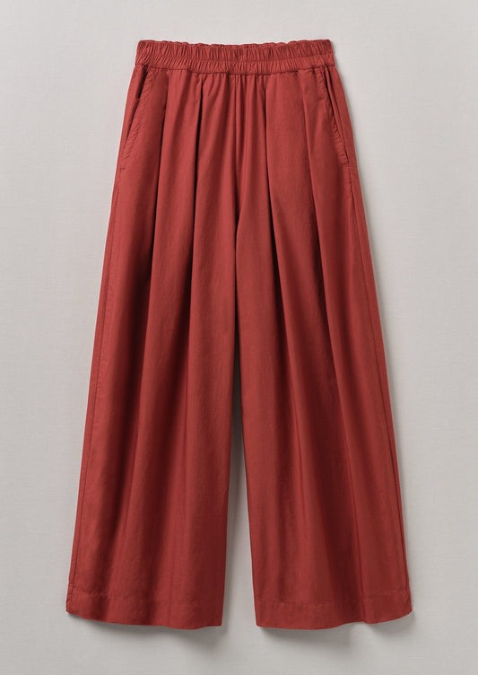 Pantaloni in popeline di cotone plissettato | Mattone