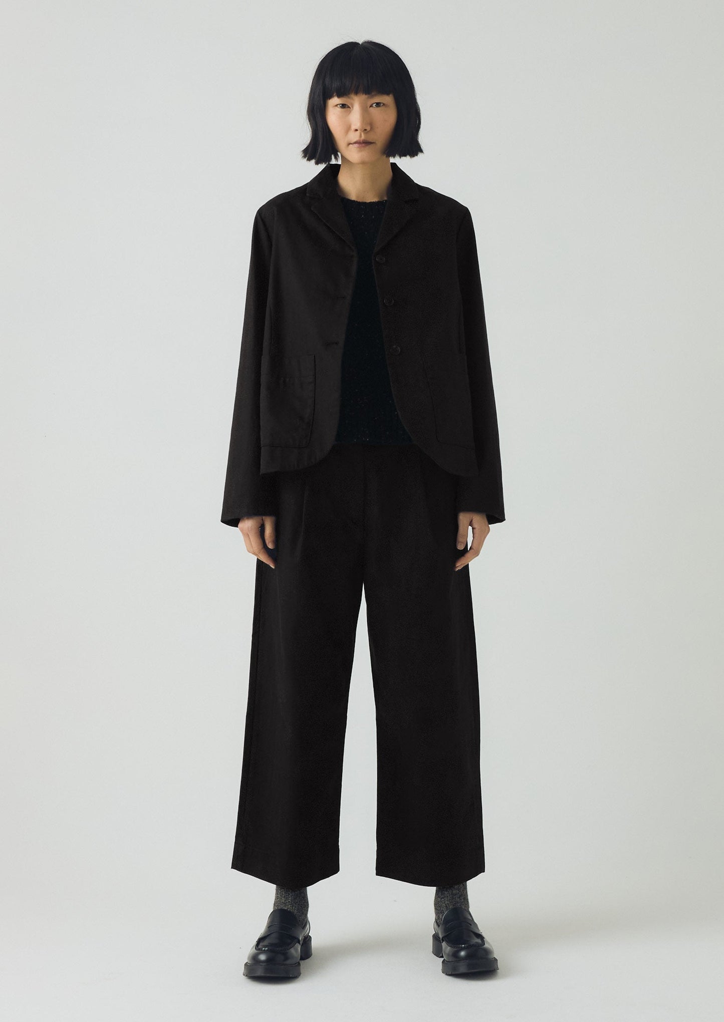 Pantaloni in cotone e lana a spina di pesce con pieghe sul davanti | Nero